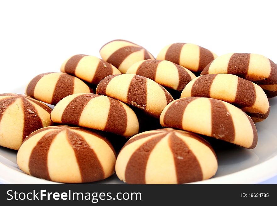 Cookies in plate isolated on white background.