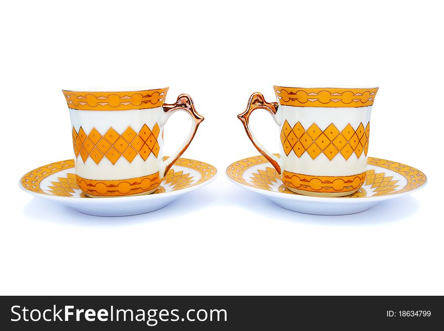 Cups with dishes isolated on white background.