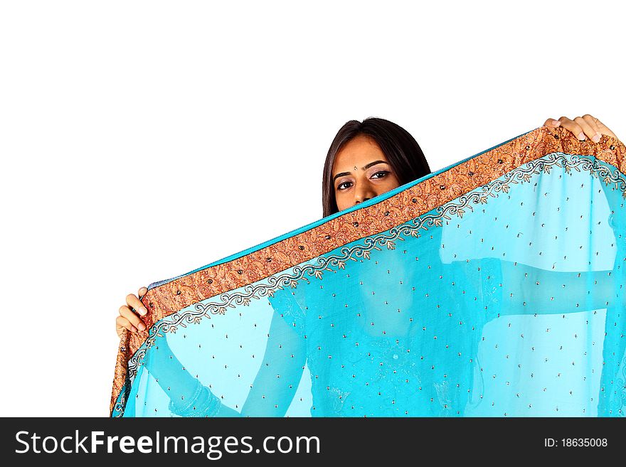 Young Indian girl in traditional clothing. Isolated on a white background.