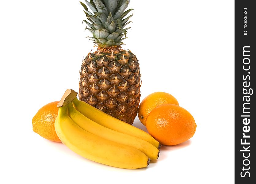 Pineapple, banana and orange on white background. Pineapple, banana and orange on white background