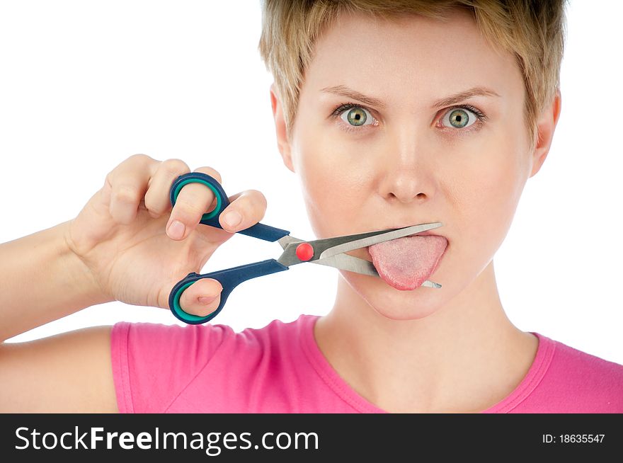 Beautiful short haired blonde woman looking seriously into the camera and cutting her tongue with pair of scissors. Isolated on white background. Beautiful short haired blonde woman looking seriously into the camera and cutting her tongue with pair of scissors. Isolated on white background