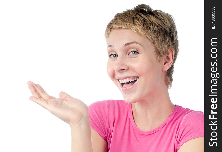 Beautiful short haired blonde woman smiling,  looking into the camera, holding something on the palm of her hand. Isolated on white background. Beautiful short haired blonde woman smiling,  looking into the camera, holding something on the palm of her hand. Isolated on white background