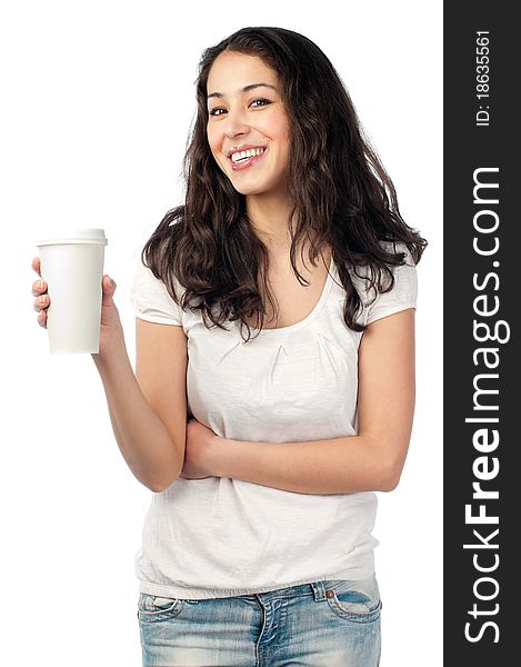 Beautiful young woman with dark wavy hair smiling and looking into the camera, holding cup of coffee in her hand. Isolated on white background. Beautiful young woman with dark wavy hair smiling and looking into the camera, holding cup of coffee in her hand. Isolated on white background.