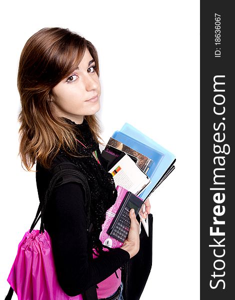 View of a teenager school girl holding books on a white background. View of a teenager school girl holding books on a white background.