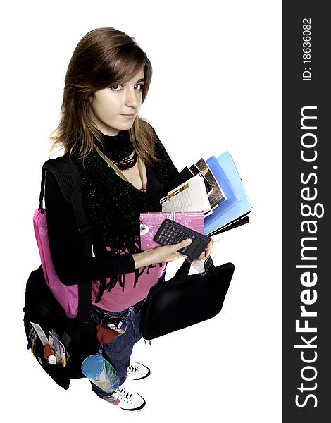 View of a teenager school girl holding books on a white background. View of a teenager school girl holding books on a white background.