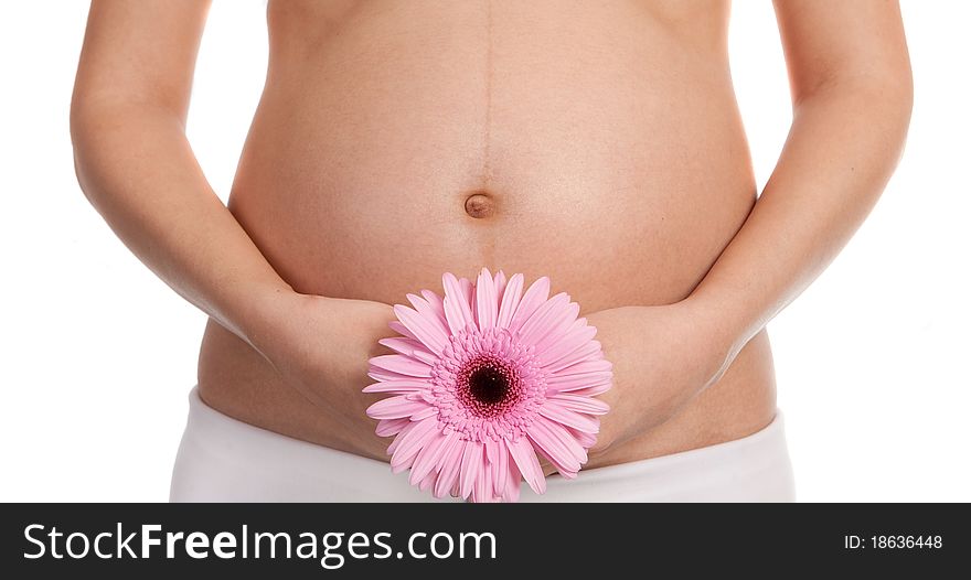 Pregnant woman with pink flower
