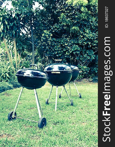 3 barbeque grills/braaistands in the garden. 3 barbeque grills/braaistands in the garden