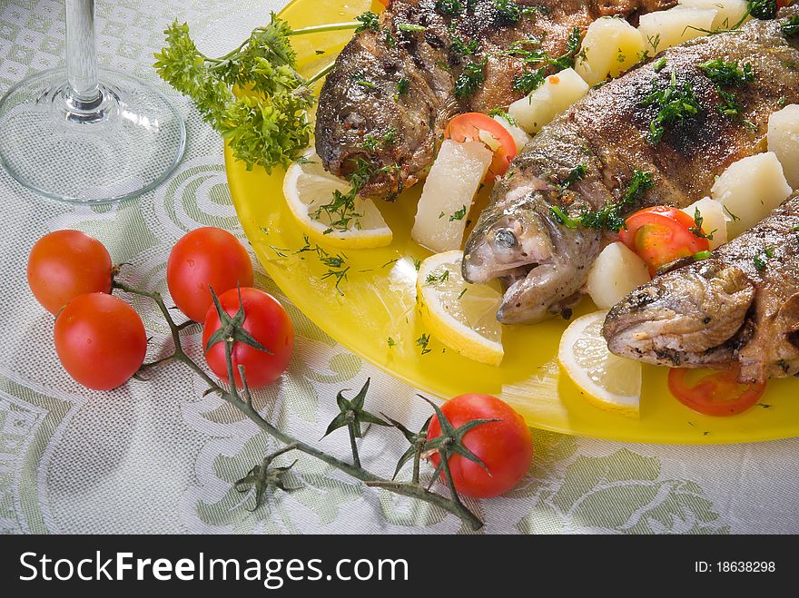 Prepared grilled trout with vegetables