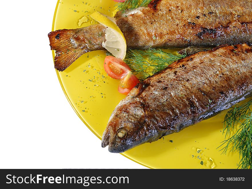Prepared grilled trout with vegetables. Prepared grilled trout with vegetables