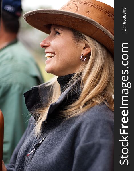 Girl In Brown Hat In Field