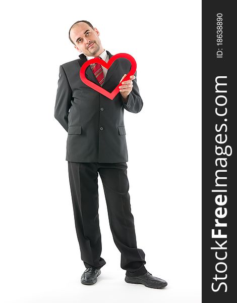 In love man with red heart on white background. In love man with red heart on white background.