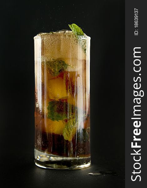 Glass With Cola Ice And Mint.