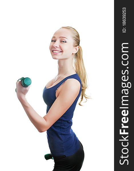 Blonde svelte girl with dumbbells isolated on white