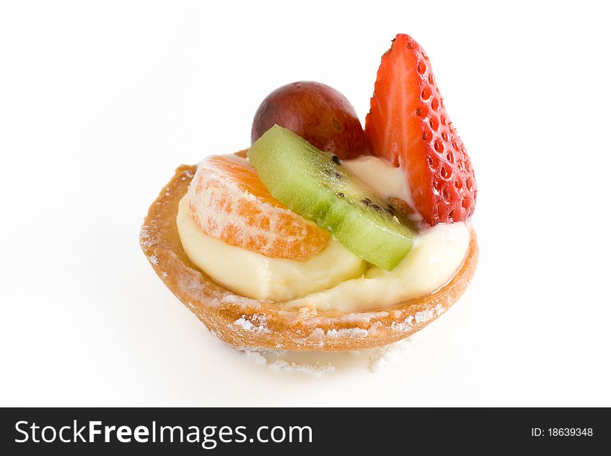 Small pie with cream and different fruits. Small pie with cream and different fruits