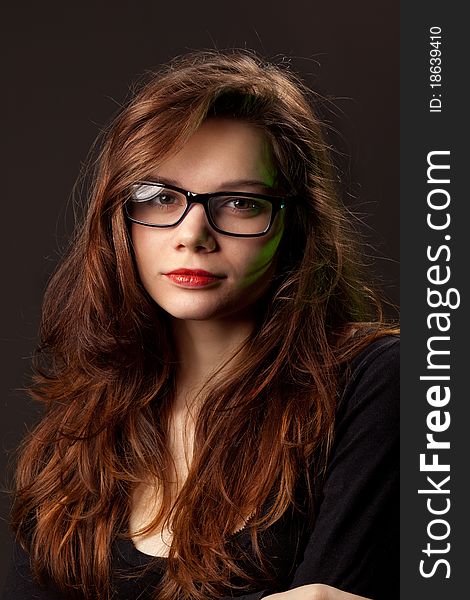 Photo of girl with glasses in studio. Photo of girl with glasses in studio