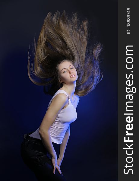 woman dancing, dark background. woman dancing, dark background