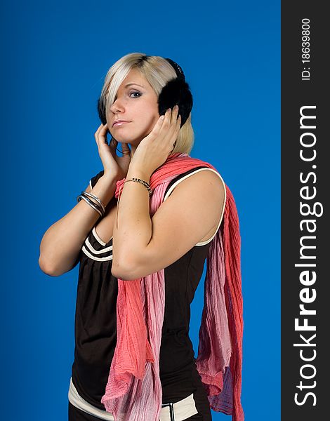 Beautiful stylish girl in headphones