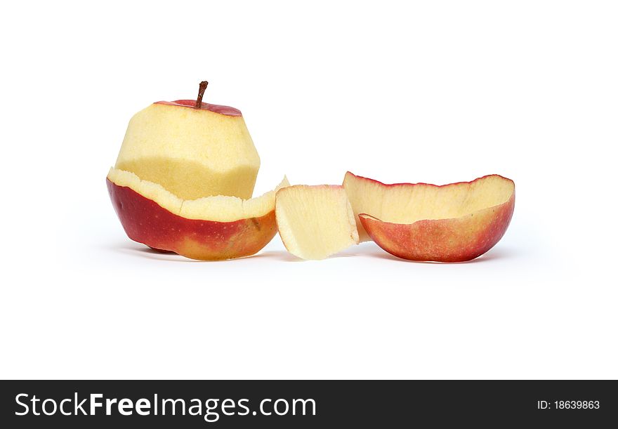 Apple peeled with twisting skin against white background. Clipping path is included. Apple peeled with twisting skin against white background. Clipping path is included