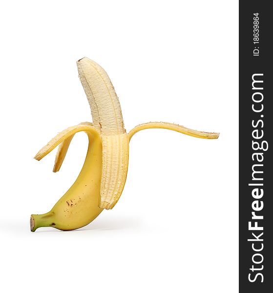 Banana peeled isolated on white background with clipping path. Banana peeled isolated on white background with clipping path