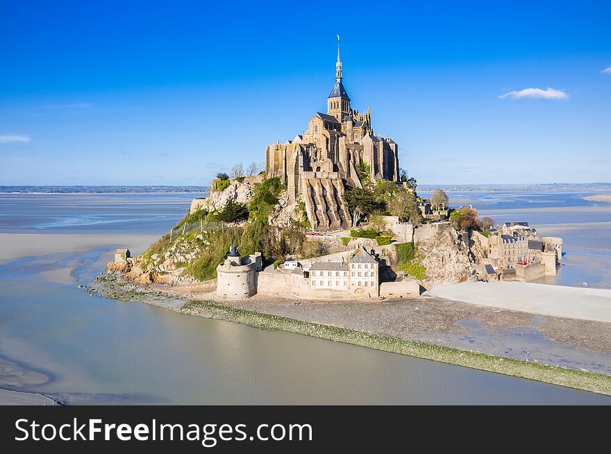 Aerial The famous of top view with blue sky at Mont-Saint-Michel, Normandy, France