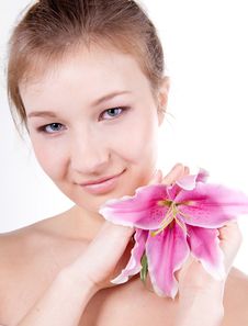 Close-up Of Beautiful Woman With Lily Flower Royalty Free Stock Photography