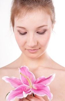 Close-up Of Beautiful Woman With Lily Flower Stock Photo