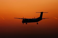Turboprop Plane Landing Silhouette Stock Photo