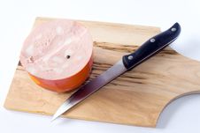 Mortadella And Knife Stock Images