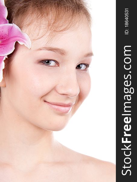 Close-up studio portrait of beautiful teenage girl with lily flower. Close-up studio portrait of beautiful teenage girl with lily flower