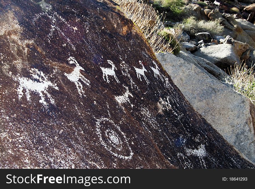 Written thousands of year ago these ancient petroglyphs can be found in Grapevine Valley, Arizona. Written thousands of year ago these ancient petroglyphs can be found in Grapevine Valley, Arizona.