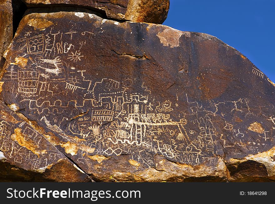 Written thousands of year ago these ancient petroglyphs can be found in Grapevine Valley, Arizona. Written thousands of year ago these ancient petroglyphs can be found in Grapevine Valley, Arizona.