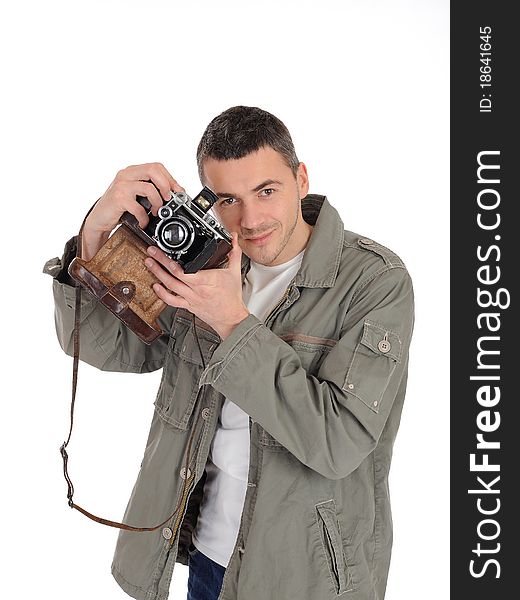 Young professional photographer with old retro film camera. isolated on white background. Young professional photographer with old retro film camera. isolated on white background