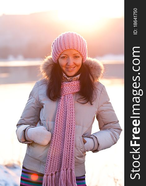 Positive smiling girl in winter clothes