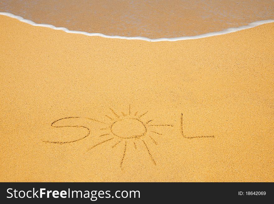 The Word Sol Written On Beach Sand With Wave