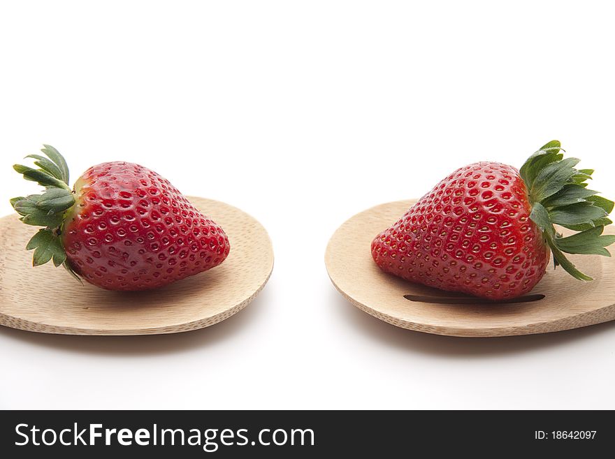 Strawberry put onto cook spoons