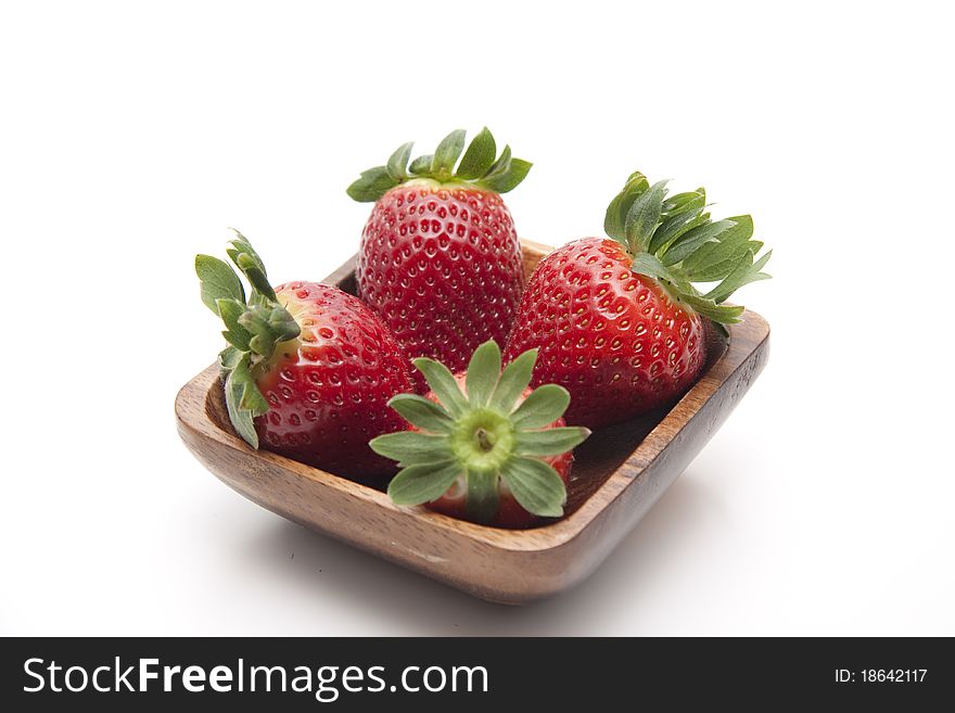 Strawberries in the wood bowl