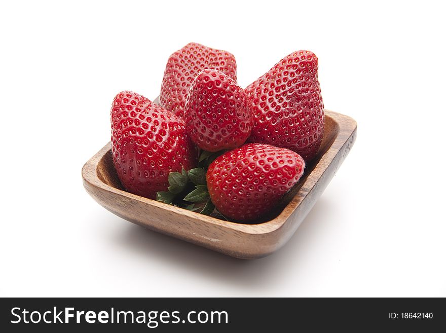Strawberries in the wood bowl