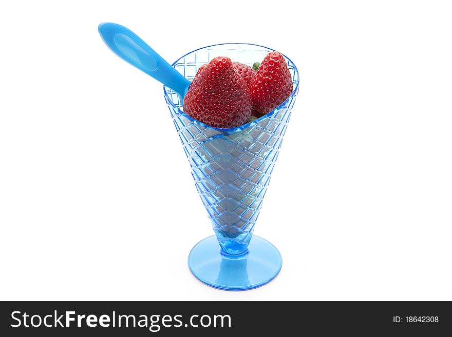 Strawberries in the ice-cream sundae with spoon