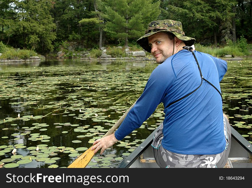 Man In Canoe