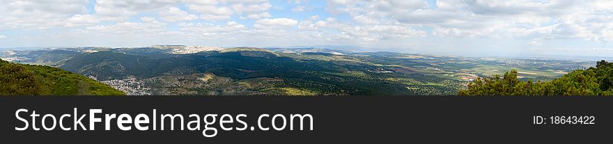 Panorama of green mountains on a summer day. Panorama of green mountains on a summer day