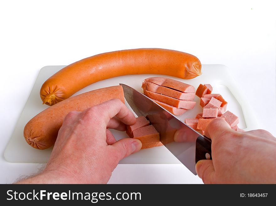 Photo from sausage, and how to cut it into pieces. Photo from sausage, and how to cut it into pieces.