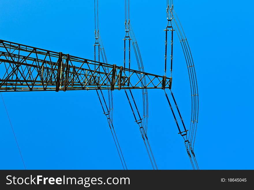 High voltage tower on a background of the sky