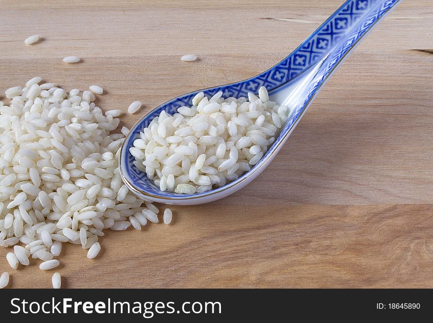 Rice and porcelain spoon