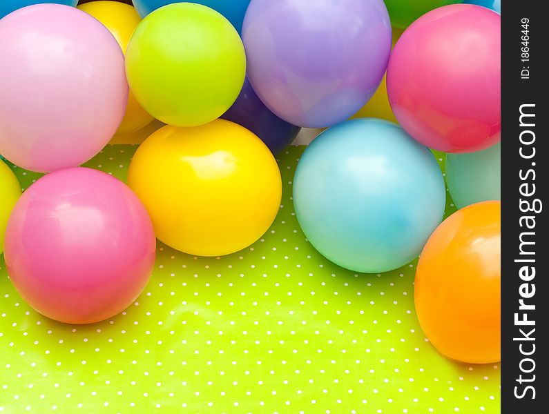 Color balloons on the green background