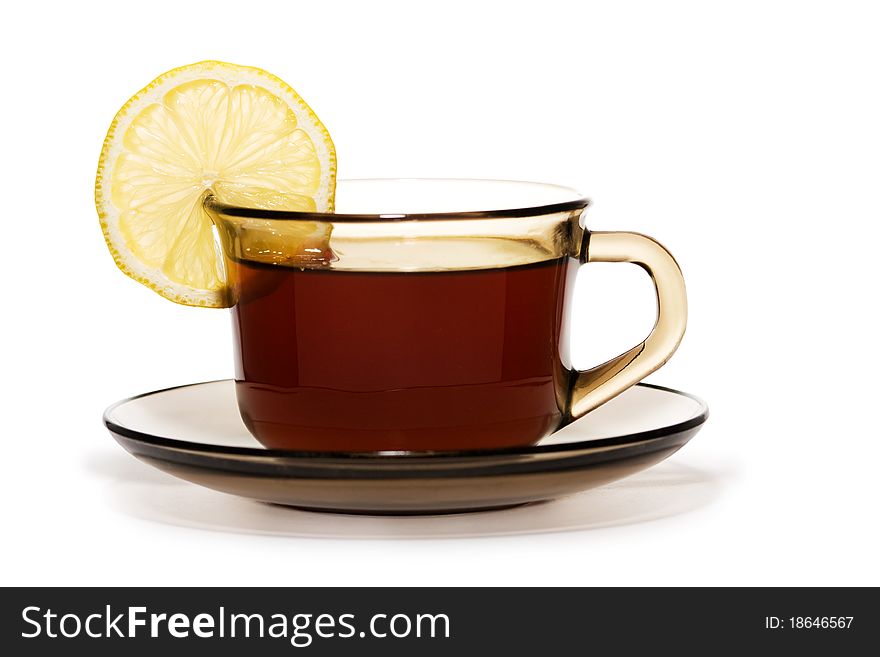 Cup of tea with lemon isolated on a white background