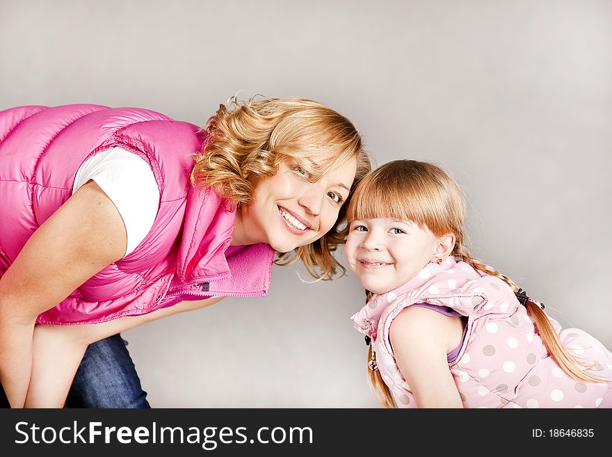 Portrait Of Two Young Beautiful Girls Smiling