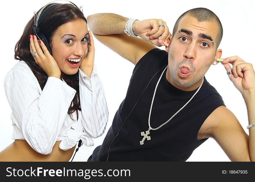 Young couple with headphones and crazy fun. Young couple with headphones and crazy fun