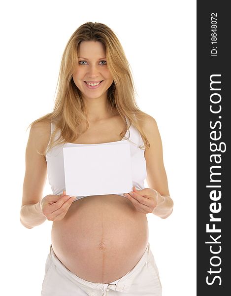 Happy pregnant woman with a blank form is isolated on a white