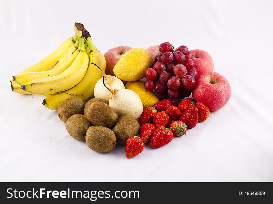 A pile of fruits on pure white.