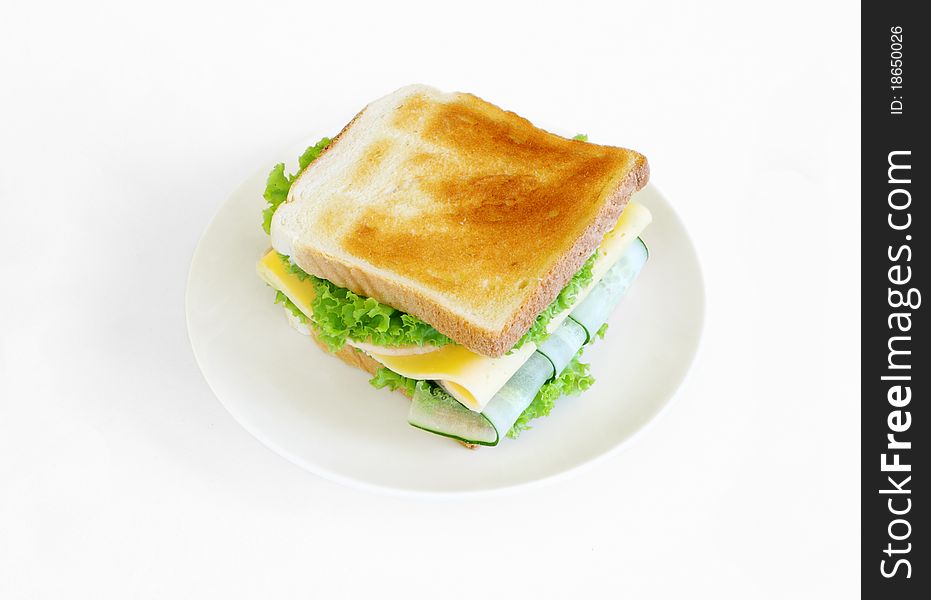 Sandwich with cheese, lettuce,bread and cucumber